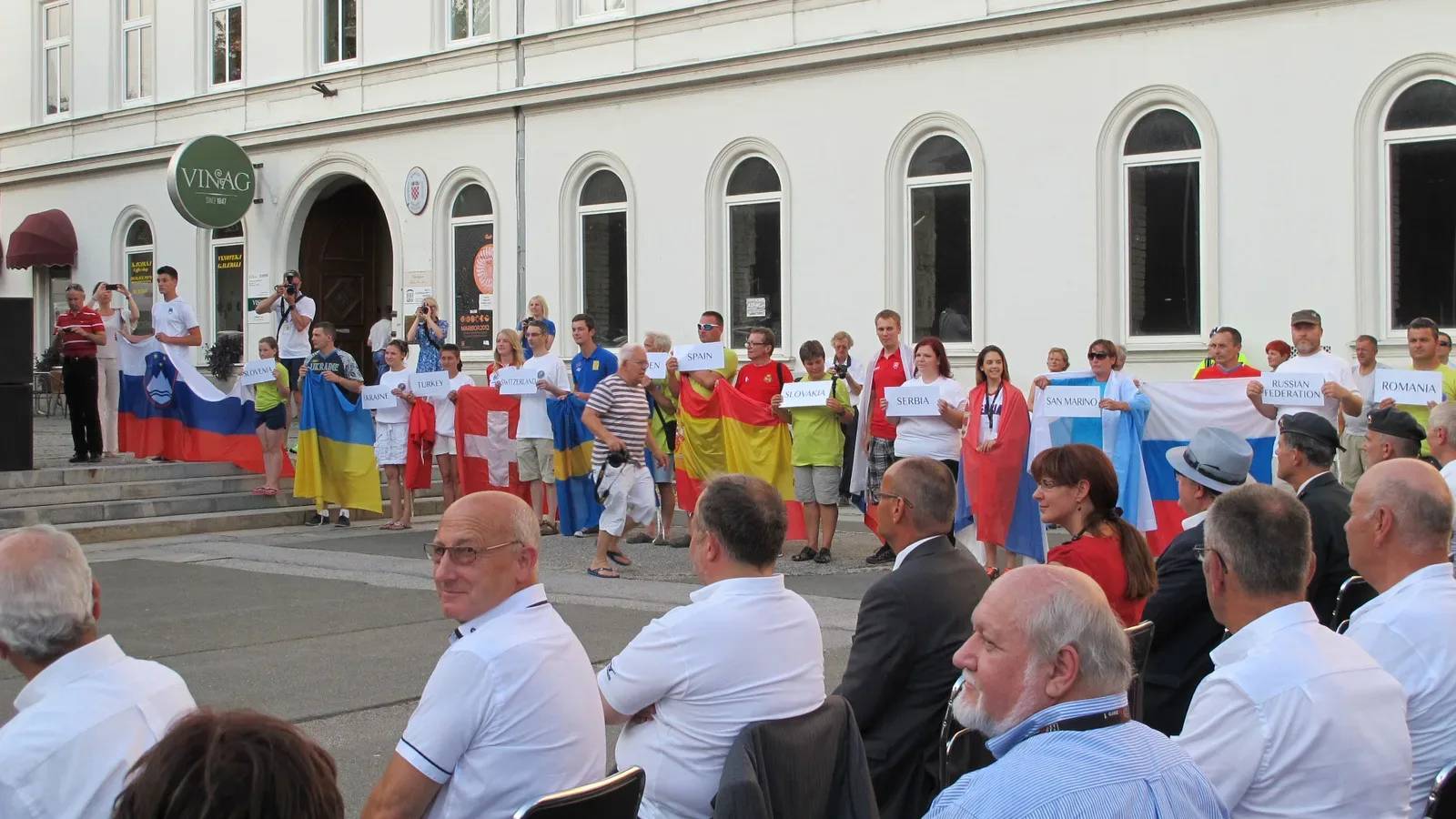 Competitive shooter at the 2015 European Shooting Championships, aiming rifle at target during match