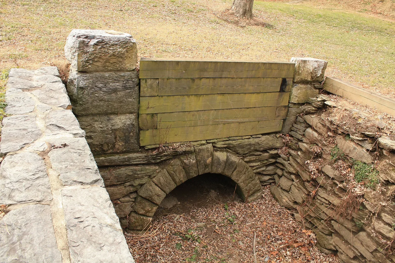 Historic retaining wall structure at the Musket Factory site in Harpers Ferry, showing the remaining masonry from the armory complex