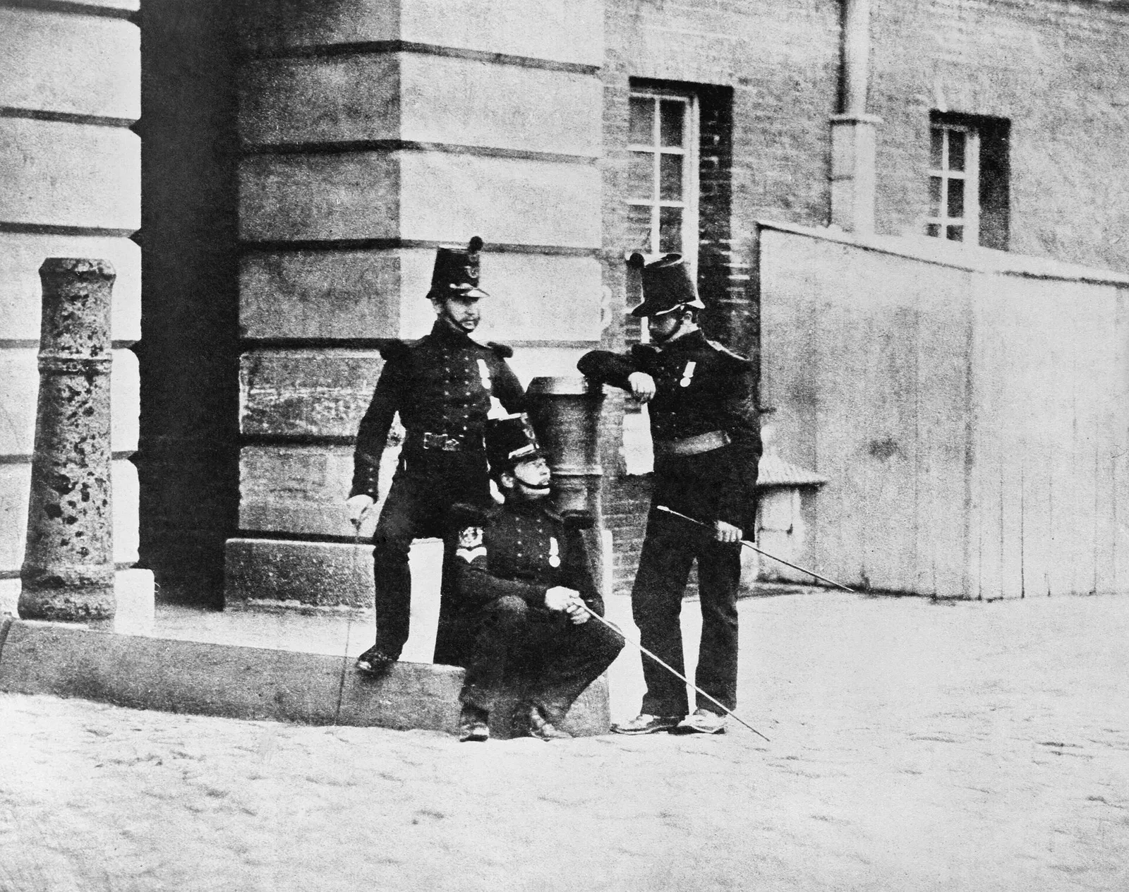 Historical photograph from the Crimean War era (1854-1856) showing soldiers with rifles in combat conditions