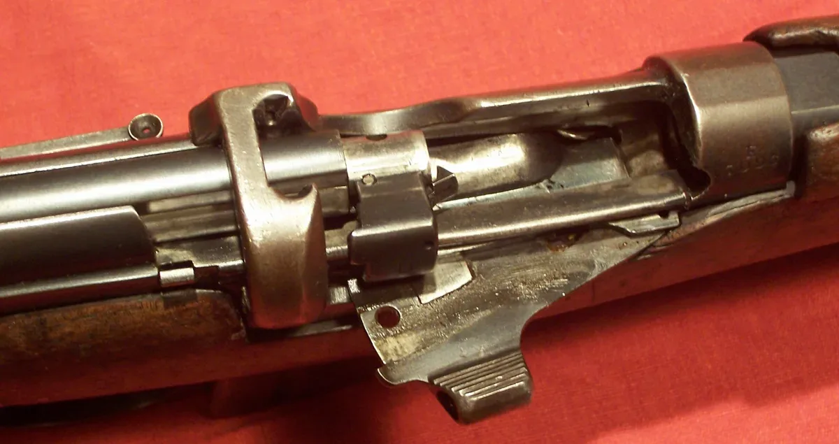 The receiver and action of a 1908 RSAF Enfield .303 calibre Short Magazine Lee-Enfield rifle, showing the bolt mechanism and internal components.