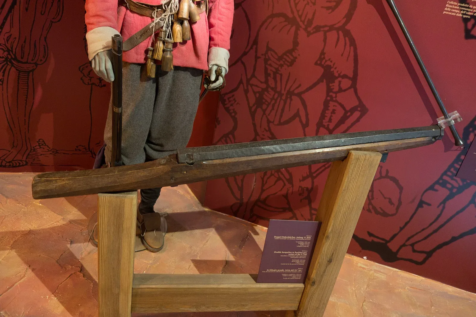 A double arquebus from Austria, showing two matched barrels mounted on a single stock, representing an evolved design variant of the arquebus.