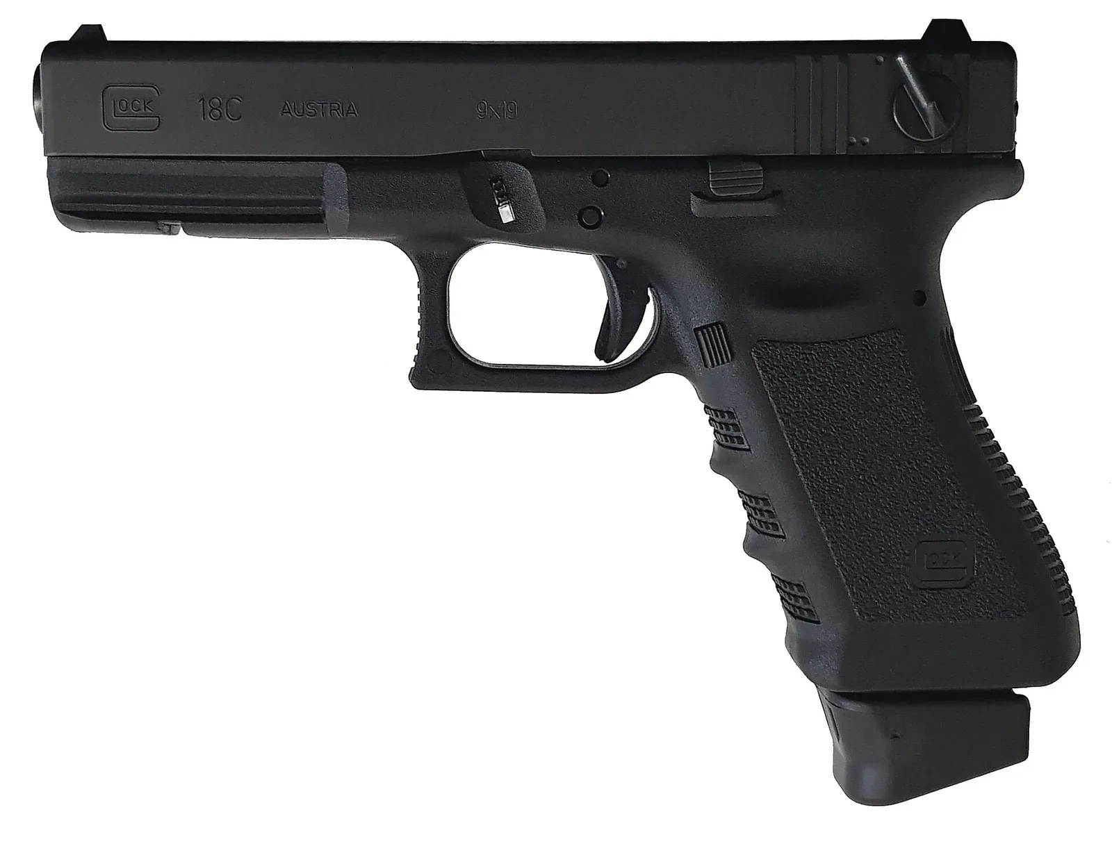 Glock 18C third-generation pistol with compensator, shown unloaded with a 19-round magazine nearby