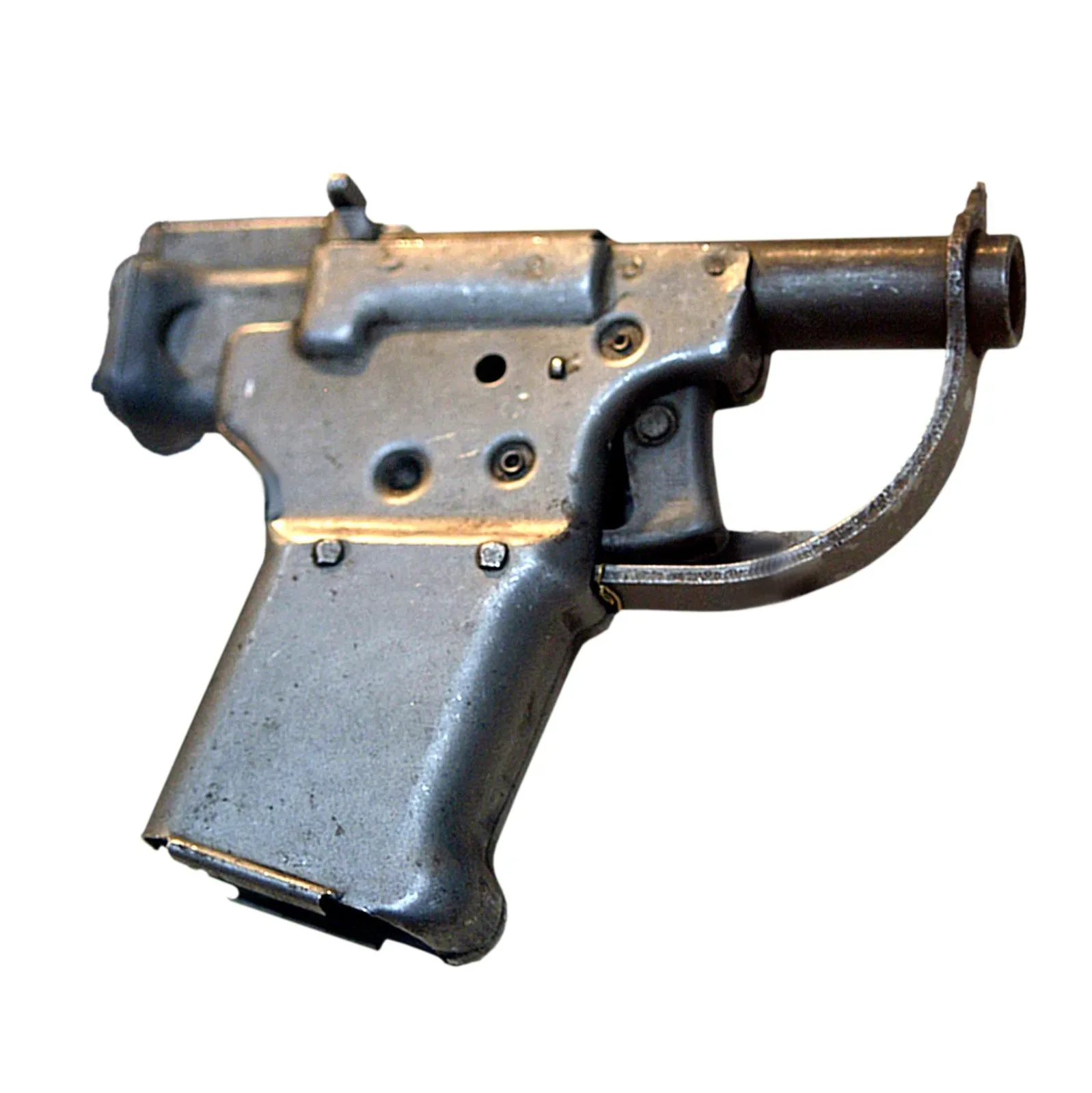 Top and side view of an FP-45 Liberator pistol, a small single-shot handgun with a simple metal construction and wooden grip
