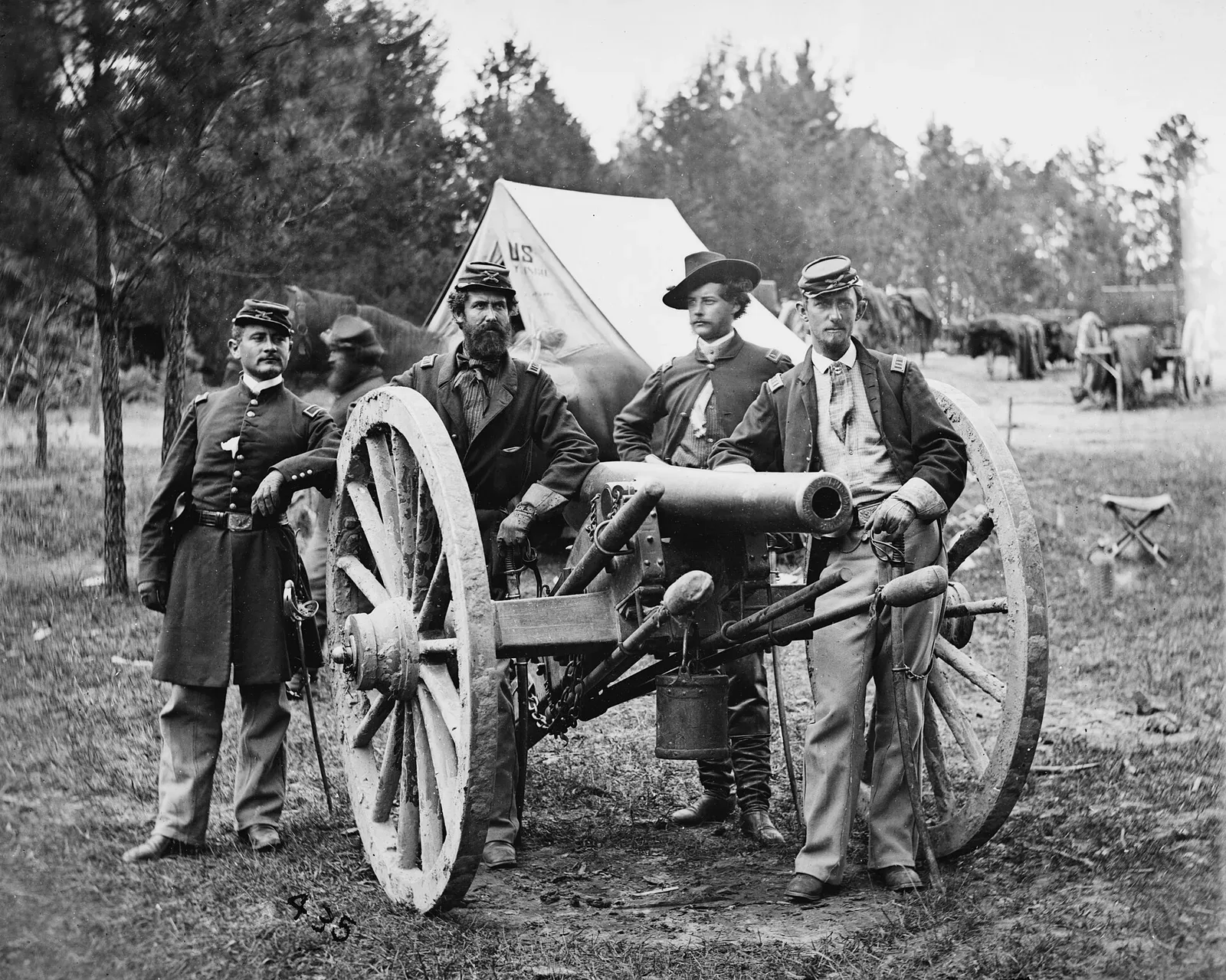 Photograph of Union Army officers at Fair Oaks, Virginia, showing Lt. Robert Clarke, Capt. John C. Tidball, Lt. William N. Dennison, and Capt. Alexander C.M. Pennington with artillery battery