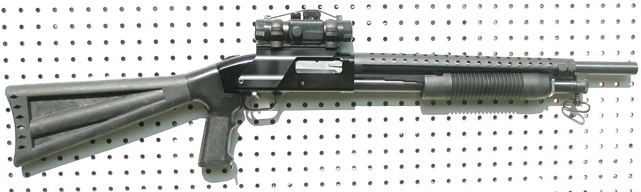 Mossberg 500 Law Enforcement Combo shotgun with two barrels and a black pistol grip stock, displayed against a white background.