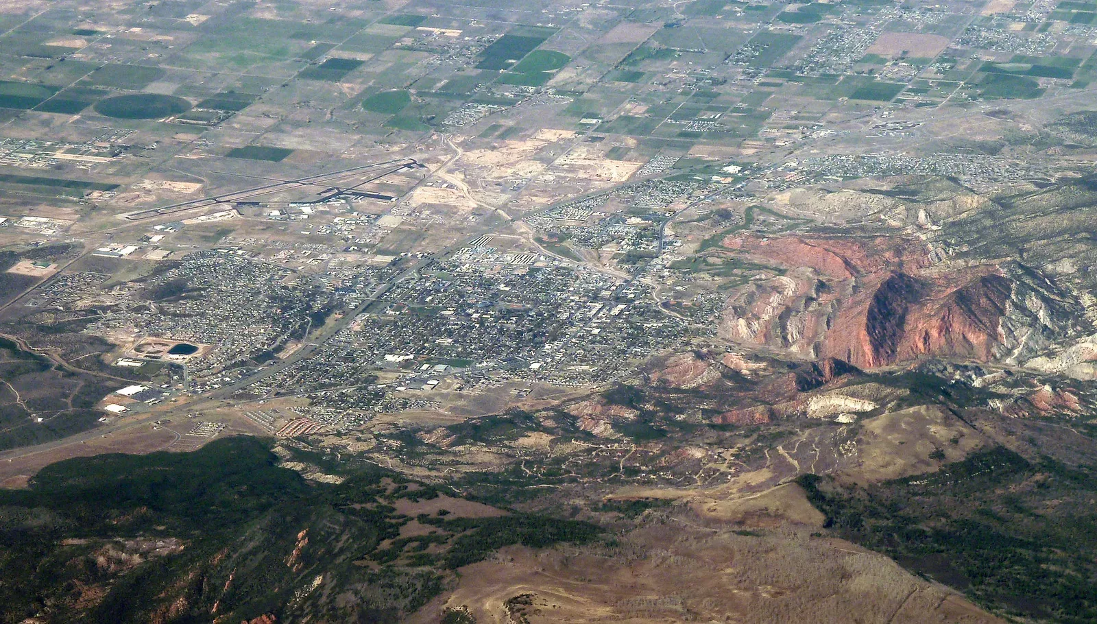 Aerial photograph of Cedar City, Utah showing the city layout and surrounding landscape