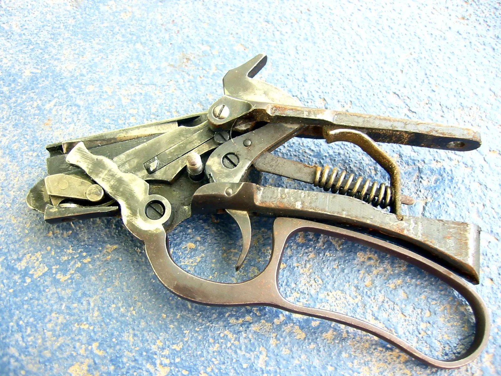 Interior view of the receiver of a Marlin 39A lever-action rifle in .22 caliber, showing the mechanical components and internal design of the action.