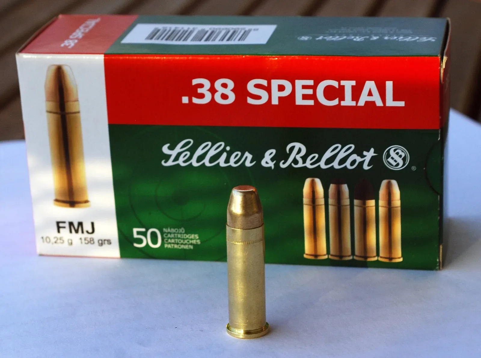 .38 Special full metal jacket cartridges next to Sellier & Bellot ammunition box