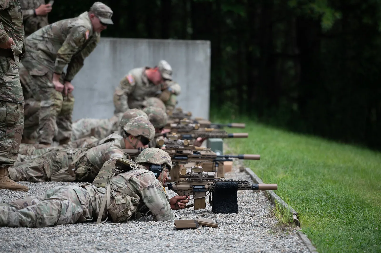 Virginia Army National Guard soldier firing the XM7 rifle during a military competition, demonstrating the weapon in operational context.