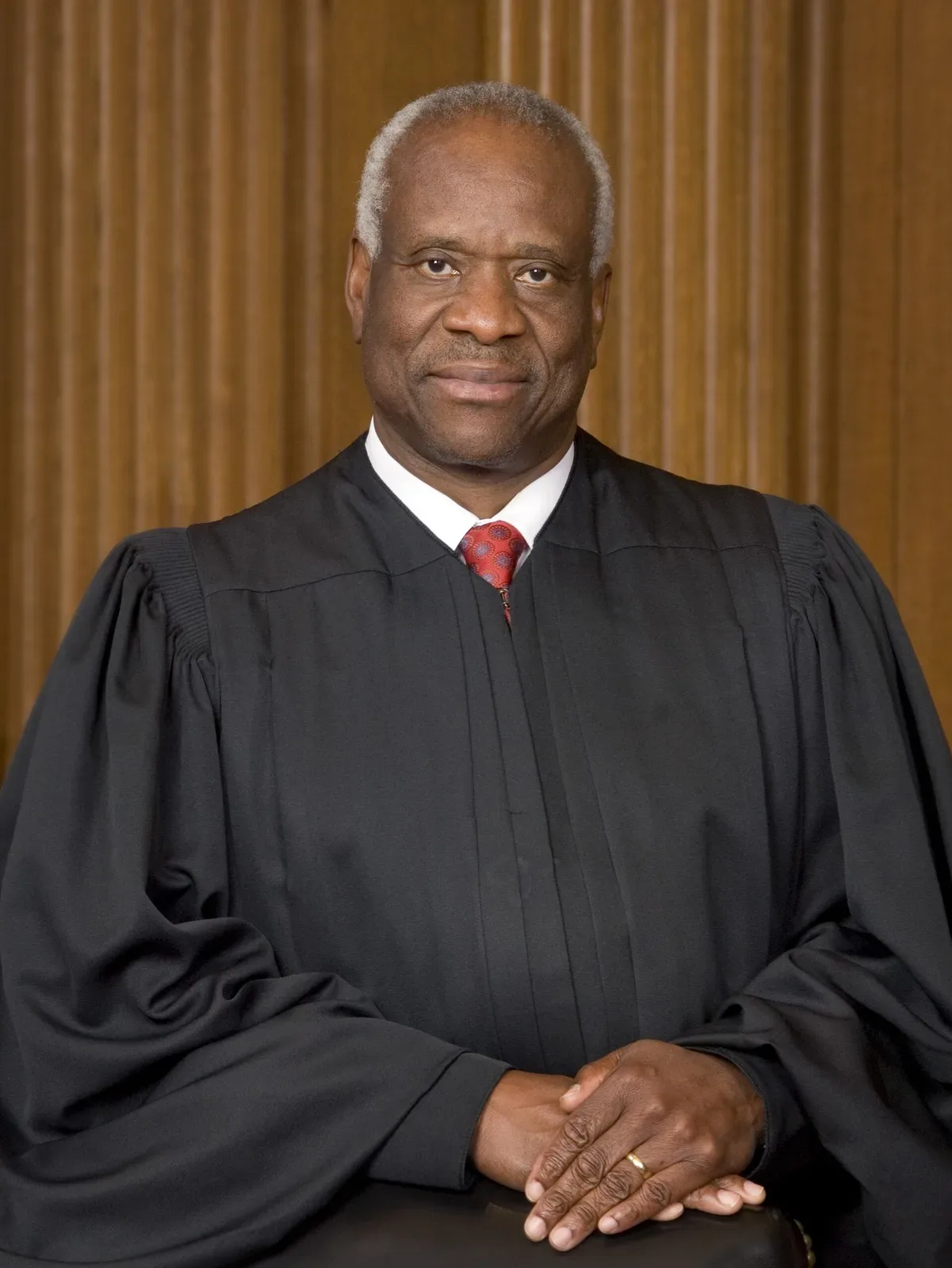 Official portrait of Clarence Thomas in judicial robes as Associate Justice of the Supreme Court of the United States