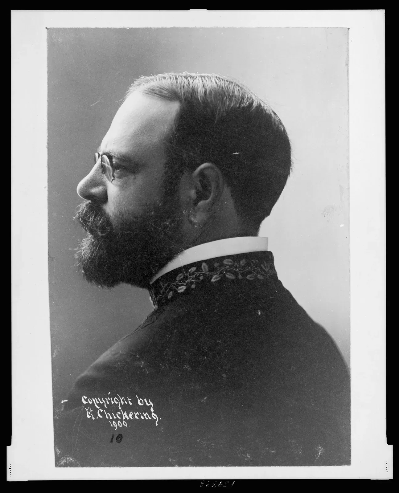 Head-and-shoulders portrait photograph of John Philip Sousa in left profile, formal studio portrait