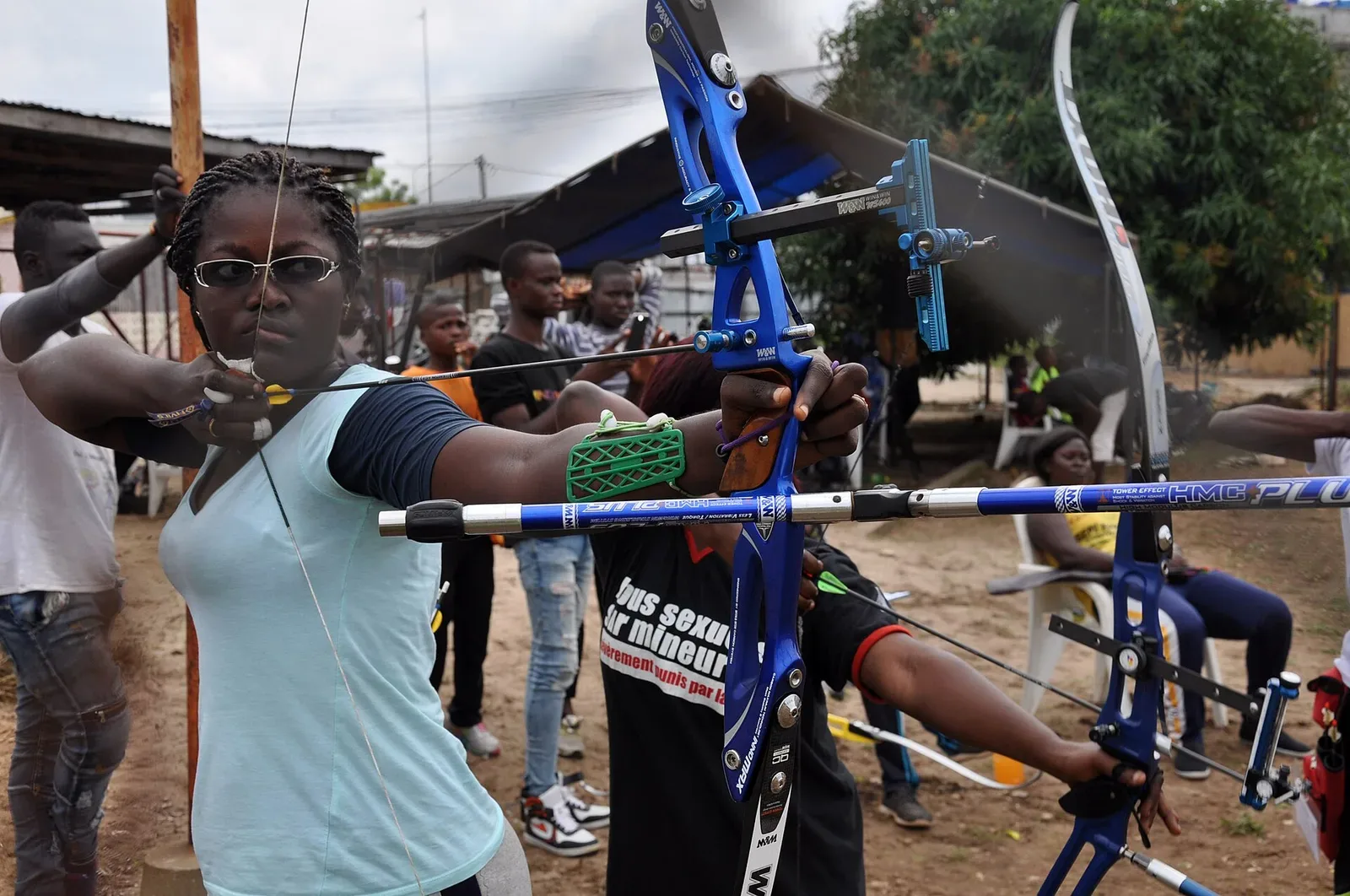 DEGAN Gabin, an archery champion, draws a compound bow during practice for an upcoming championship competition