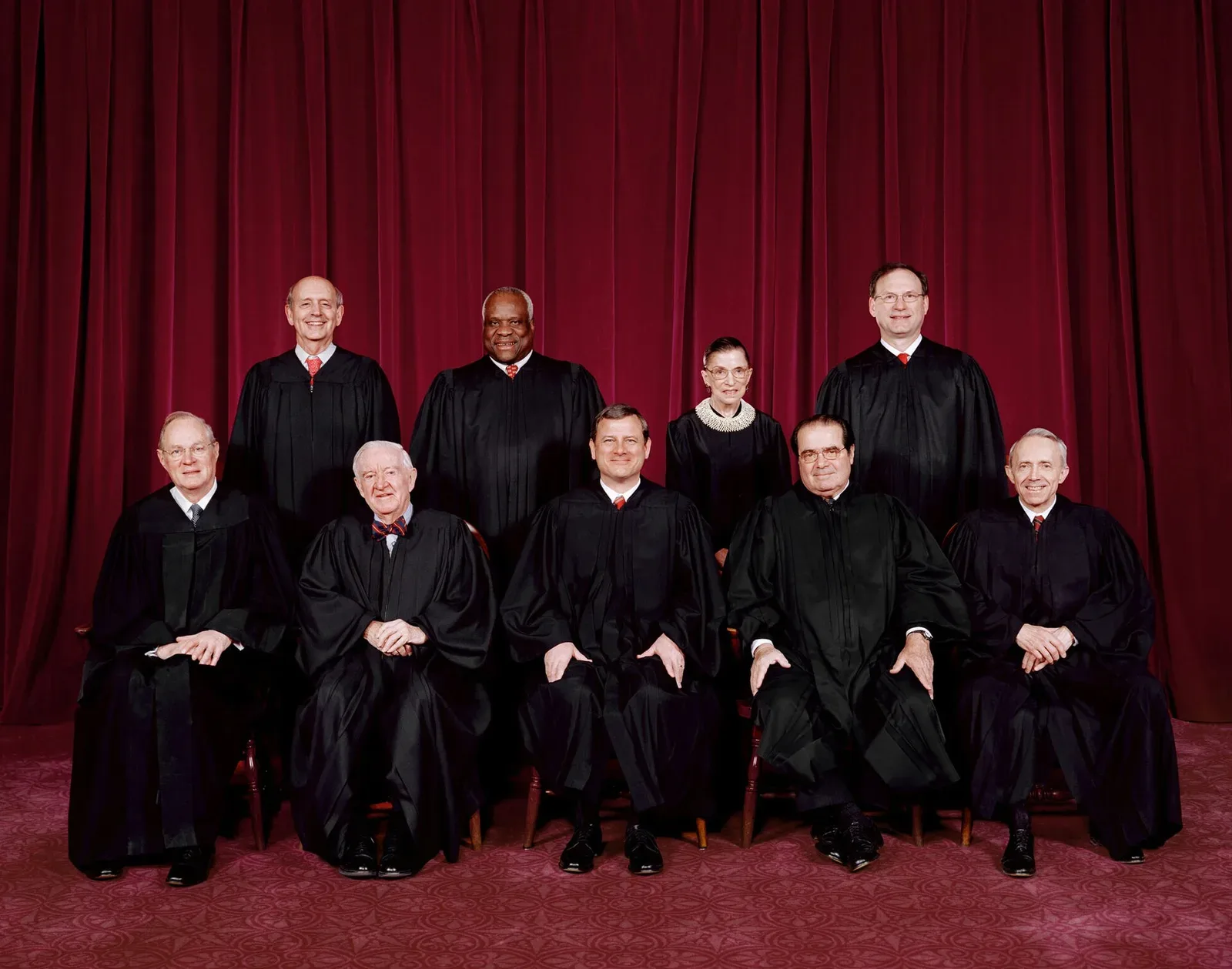 Photograph of the nine justices of the United States Supreme Court seated in their official robes in the Court chamber, 2006.