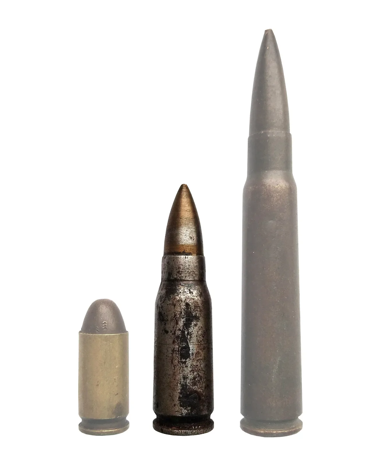 Three cartridges displayed in descending size order: a 9×19mm Parabellum pistol round on the left, a 7.92×33mm Kurz intermediate cartridge in the center, and a full-size rifle round on the right.