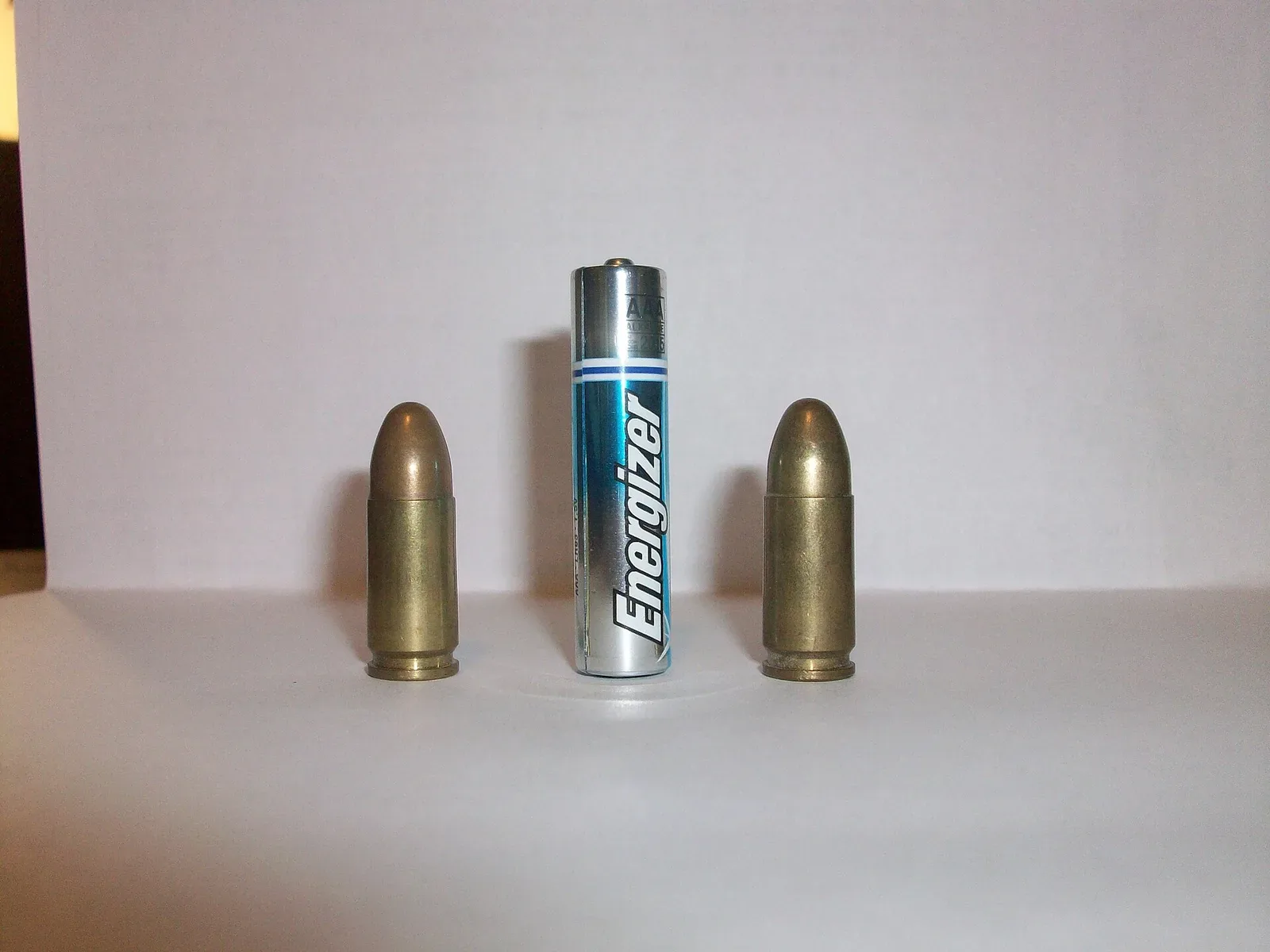 9×19mm Parabellum ammunition cartridge displayed against a neutral background